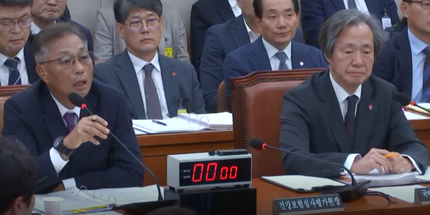 심평원 강중구 원장(왼쪽) 건보공단 정기석 이사장(오른쪽)